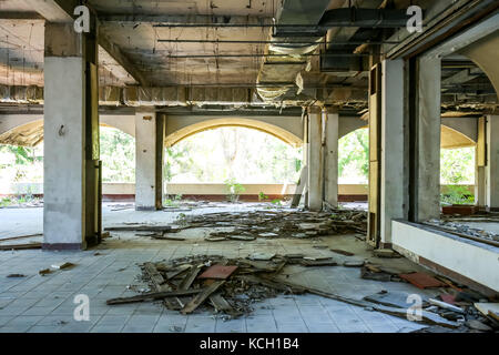 An old obsolete abandoned building that used to be a hotel in Kupari, Croatia. Stock Photo