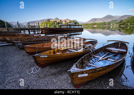 Rowing boats for hire at Keswick jetty, Derwentwater, Lake Dictrict, Cumbria, England Stock Photo