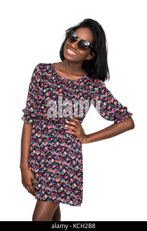 Woman with hand on hip wearing sunglasses Stock Photo