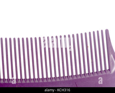Violet plastic Hair Comb on white background, image of Stock Photo