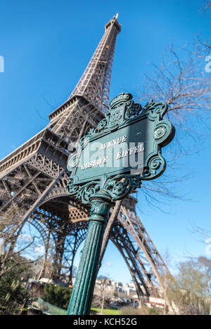 The Eiffel Tower and the Avenue Gustave Eiffel both located in Champ de Mars, Paris France. Stock Photo