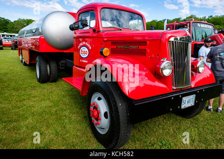 Red 1954 White Super Power tank truck used to transport Essotane, liquefied petroleum gas for Esso at Fleetwood Country Cruize-In car show, Canada Stock Photo