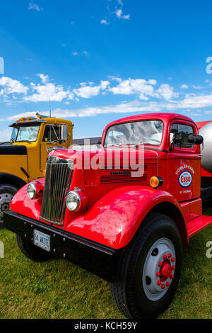 Red vintage 1954 White Super Power tank truck used to transport Essotane, liquefied petroleum gas, for Esso, built by White Motor Company, Canada. Stock Photo