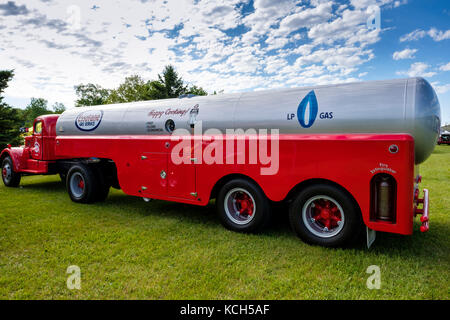 Red vintage 1954 White Super Power tank truck used to transport Essotane, liquefied petroleum gas, for Esso, London, Ontario, Canada. Stock Photo