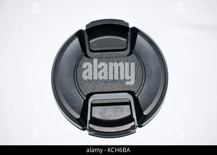 lens cap isolated on white background black color 18-55mm 52mm Stock Photo