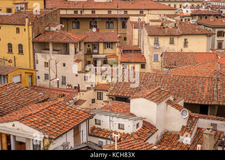 Terracotta roof tile dominate the skyline of Florence in Italy Stock Photo