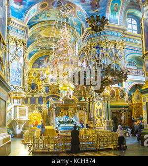 POCHAYIV, UKRAINE - AUGUST 30, 2017: The interior of Holy Dormition Cathedral in Pochayiv Lavra, on August 30 in Pochayiv. Stock Photo