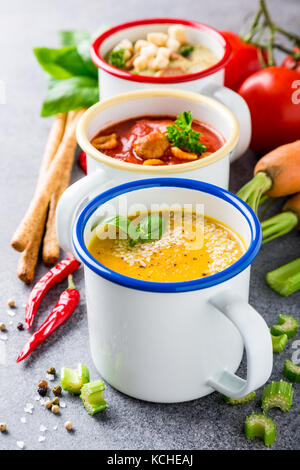 Homemade assorted soups with ingredients Stock Photo