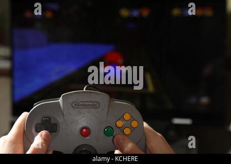 The 'Goldeneye 007' game in a Nintendo 64 or N64 video game console, a  fifth generation video game console launched in 1996 in Japan Stock Photo -  Alamy