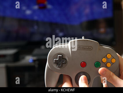 The 'Goldeneye 007' game in a Nintendo 64 or N64 video game console, a  fifth generation video game console launched in 1996 in Japan Stock Photo -  Alamy