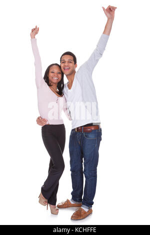 Happy Couple Raising Hand Over White Background Stock Photo