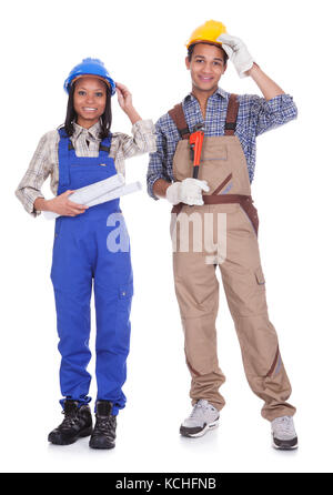Confident construction workers. Isolated on white background Stock Photo
