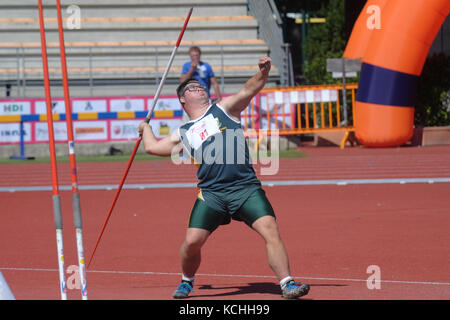 Down syndrome athlete with javelin. Trisome Games 2016. Florence, Italy. Stock Photo