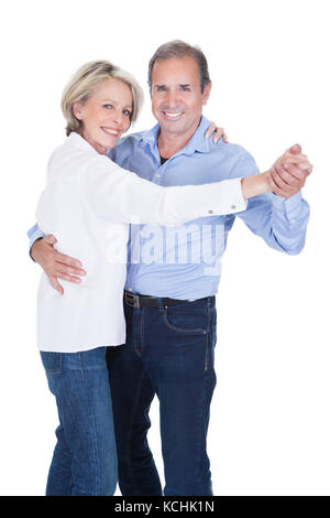Happy Mature Couple Dancing Isolated Over White Background Stock Photo
