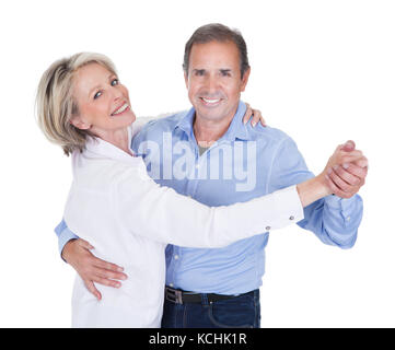 Happy Mature Couple Dancing Isolated Over White Background Stock Photo