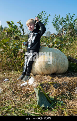 Boy wearing skeleton costume Stock Photo
