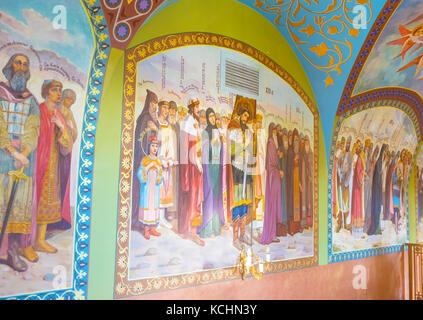 POCHAYIV, UKRAINE - AUGUST 29, 2017: St Job Church in Pochayiv Lavra boasts beautiful frescoes of Saints, painted on its walls Stock Photo