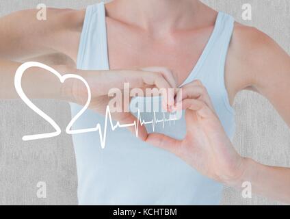 Digital composite of Heart beat over hands holding heart Stock Photo