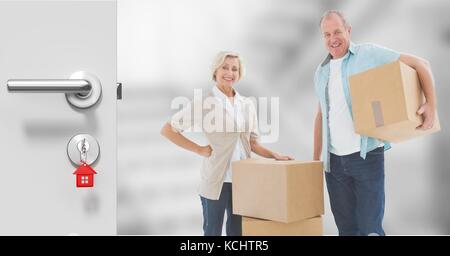 Digital composite of people moving boxes into new home Stock Photo