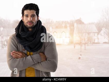 Digital composite of Man in Autumn with  with scarf and folded arms in housing estate Stock Photo
