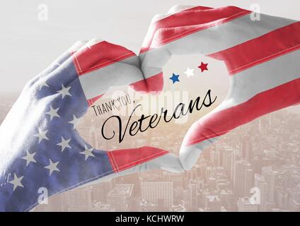 Digital composite of Veterans day, flag usa on hands with text Stock Photo