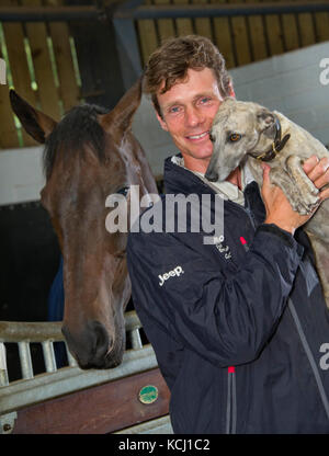 Equestrian William Fox-Pitt with his dog 'Poppy' Stock Photo