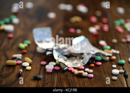 Multicolored tablets of different shapes and sizes Stock Photo