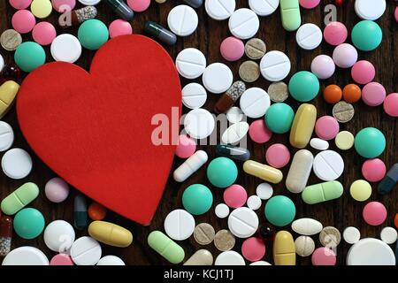 Multicolored tablets of different shapes and sizes Stock Photo