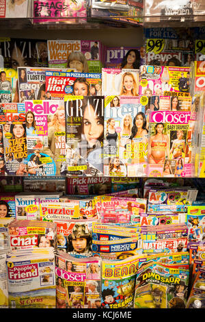 Magazines on sale in a supermaket Stock Photo