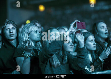 Justin Bieber fans, so called Beliebers, attend a live concert with he Canadian singer and songwriter Justin Bieber at Telia Parken in Copenhagen. The concert was part of the Purpose World Tour 2016. Denmark, 02/10 2016. Stock Photo