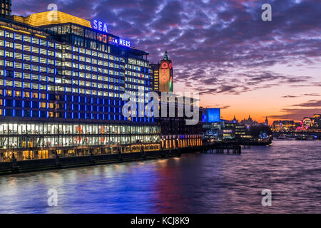 Over the Thames in London to the Sea Containers Building at sunset. Stock Photo