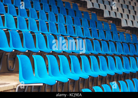 Blue plastic stadium seats as repeating pattern Stock Photo