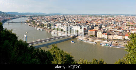 3 picture stitch panoramic cityscape view of the Danube River in Budapest on a sunny day with Elisabeth Bridge foreground and Chain Bridge background. Stock Photo