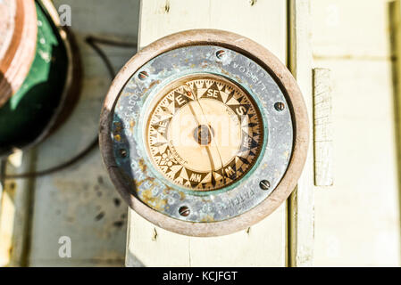 Szczecin, Poland, 7 august 2017:  Old classic compass on a sailing yacht during the TTSR final in Szczecin. Stock Photo