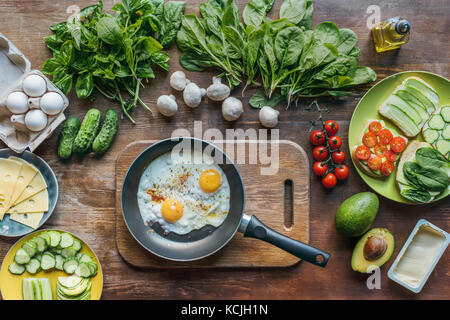 fried eggs in frying pan Stock Photo