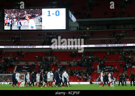 Wembley, UK. 05th Oct, 2017. England players and staff do a lap of honour, after qualifying for the World Cup, in front of an almost empty stadium at the England v Slovenia FIFA World Cup Qualifier 2018 match at Wembley Stadium, London, on October 5, 2017. Credit: Paul Marriott/Alamy Live News Stock Photo