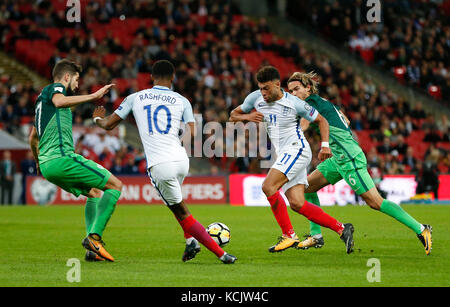 London, London, UK. 5th Oct, 2017. Alex Oxlade-Chamberlain (2nd R) of England breaks through during the FIFA World Cup 2018 European Qualifier Group E match between England and Slovenia at Wembley Stadium, in London, Britain on Oct. 5, 2017. England won 1-0. Credit: Han Yan/Xinhua/Alamy Live News Stock Photo