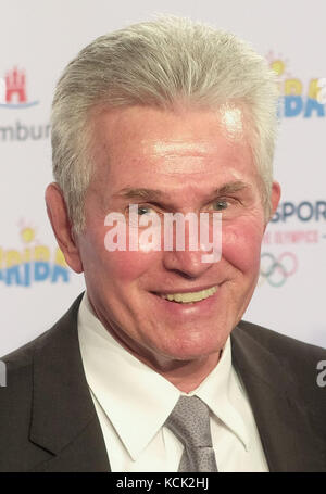 FILE - File picture dated 03 April 2017 showing soccer coach Jupp Heynckes laughing on the red carpet ahead of the award of the German Sports Journalists Prize in Hamburg, Germany. FC Bayern Munich have signed Jupp Heynckes as the club's new head coach. The record champion club announced on 06 June 2017 that the 72-year old Heynckes will replace former coach Ancelotti with a contract until the end of this season. Photo: Axel Heimken/dpa Stock Photo
