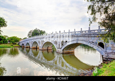 The Double Beauty Bridge connects the Chinese Garden and the Japanese Garden in Singapore, two free public parks collectively known as Jurong Lake Gar Stock Photo