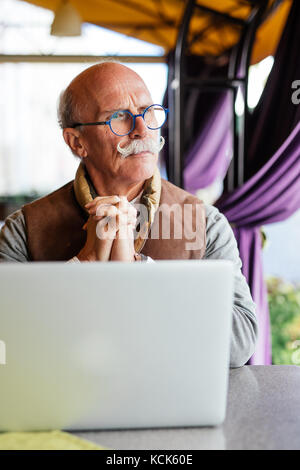 Senior Man Working Coffee Shop Relaxation Concept Stock Photo