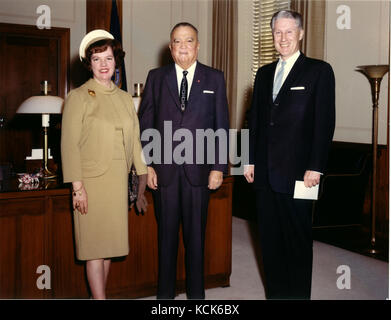 Adelphi, MD - (FILE) -- On January 26, 1967, Assistant Director  W. Mark Felt of the Inspection Division, right, accompanied by his wife, left, was photographed with Federal Bureau of Investigation (FBI) Director J. Edgar Hoover, center, following the presentation of his 25-Year Service Award Key at FBI Headquarters in Washington, D.C.  Mr. Felt revealed in the July, 2005 issue of Vanity Fair magazine he is the source known as 'Deep Throat' that provided key information to the Washington Post during the Watergate scandal which resulted in the resignation of United States President Richard M. N Stock Photo