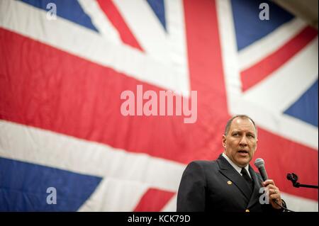 U.S. Navy Commanding Officer Will Pennington speaks during a reception for senior military and political leaders aboard the U.S. Navy Nimitz-class aircraft carrier USS George H.W. Bush July 27, 2017 in Portsmouth, England.  (photo by MCS1 Sean Hurt  via Planetpix) Stock Photo