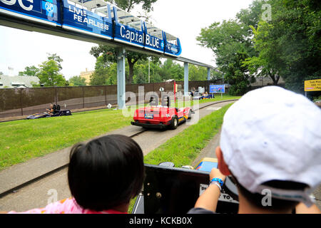 Visitors driving in Speed Way inside of Twin Turnpike in Hershey Park.Hershey.Hershey.Derry Township.Pennsylvania.USA Stock Photo