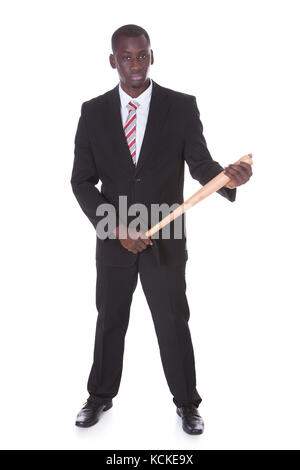 Businessman With Baseball Bat Isolated On White Background Stock Photo