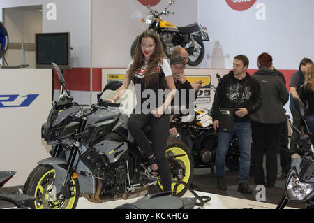 BRNO, CZECH REPUBLIC-MARCH 4,2016:  Beautiful hostess sits on motorcycle Yamaha MT 10 on International Fair for Motorcycles  on March 4,2016 in Brno i Stock Photo