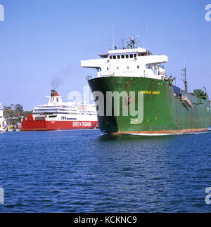 Shipping traffic on the Mersey River, daily ferry to the mainland ’Spirit of Tasmania’ in the background. Devonport, Tasmania, Australia Stock Photo