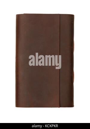 Close up of one vintage style jotter notebook with old leather cover isolated on white, elevated top view, directly above Stock Photo