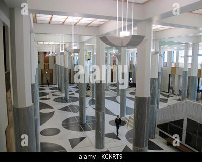 Main Foyer of Parliament House with green and cream marble pillars intended to evoke a eucalypt forest. Parliament House was opened by the Queen Eliza Stock Photo