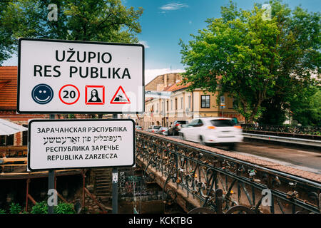 Vilnius, Lithuania - July 5, 2016: Road Sign At The Border Of Uzupis Located In Old Town Of Vilnius. District Of Vilniaus Senamiestis. UNESCO World He Stock Photo
