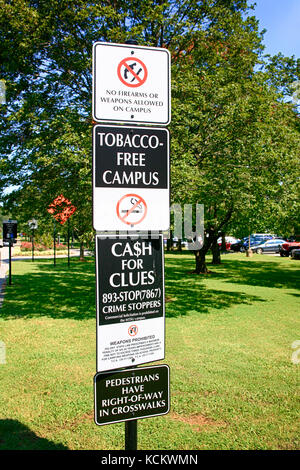 No Guns, Knives, Tobacco-free Campus, cash for clues campus Police signs on the Banners hanging from the street lights on Middle Tennessee State Unive Stock Photo